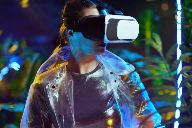 istock trendy female in virtual reality in vr goggles 1402853132