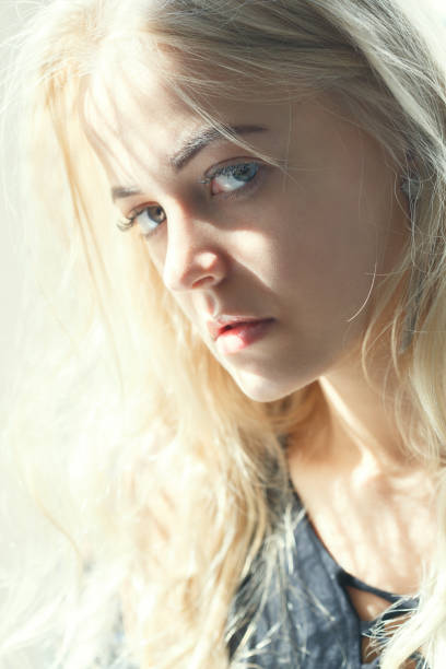 istock sad blonde woman 1402854609