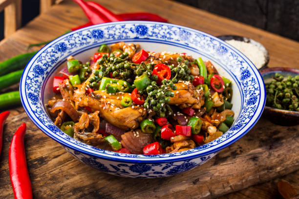 istock Stir-fried bullfrog with green and red peppers 1402856037