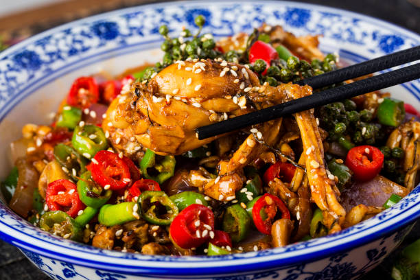 istock Stir-fried bullfrog with green and red peppers 1402856041
