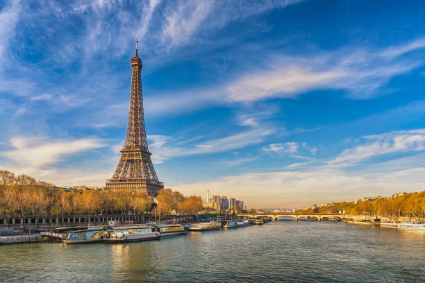 Paris France city skyline at Eiffel Tower and Seine River Jena Bridge stock photo