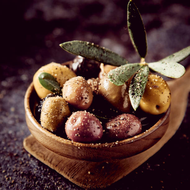 istock Tasty olives topped with condiments 1402856436