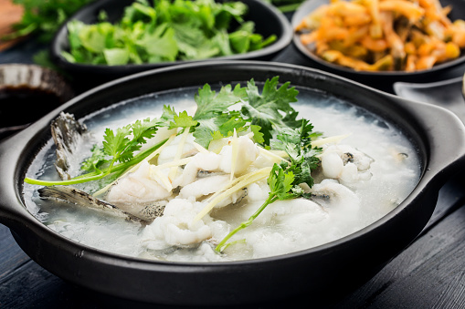Chinese cuisine; Congee with fish slices in casserole