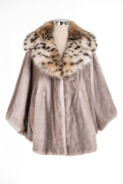 istock Expensive fur coats collection on a mannequin. 1402857736