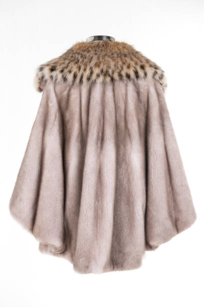 istock Expensive fur coats collection on a mannequin. 1402857789
