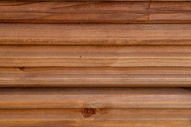 side view of wooden boards stacked on top of each other