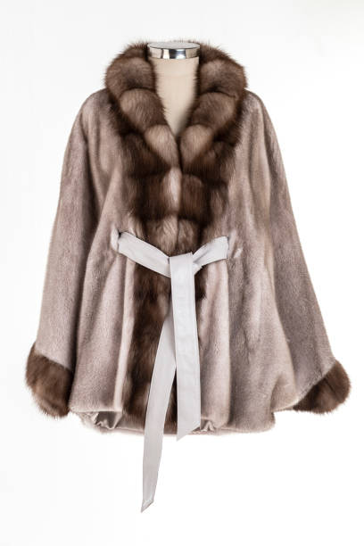 istock Expensive fur coats collection on a mannequin. 1402857834
