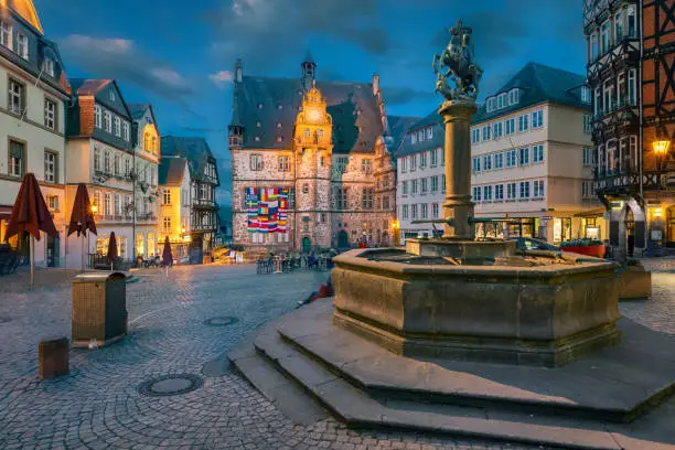 Marburg, Germany. View of Oberstadtmarkt square with historic building of Town Hall at dusk (HDR - image)