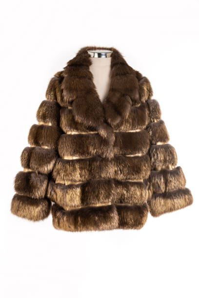 istock Expensive fur coats collection on a mannequin. 1402859384