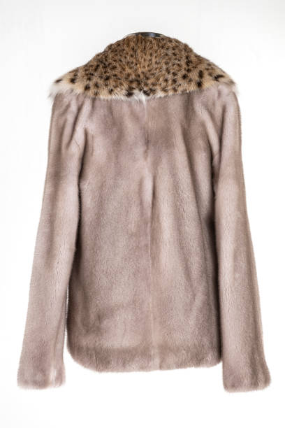 istock Expensive fur coats collection on a mannequin. 1402859743
