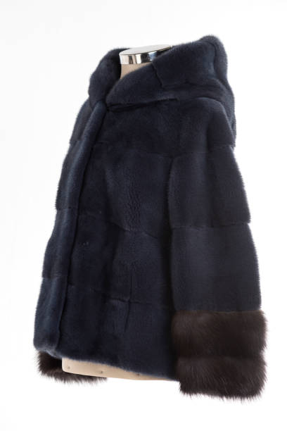 istock Expensive fur coats collection on a mannequin. 1402860533