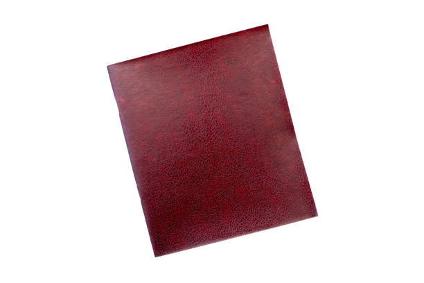 istock Notepad with blank burgundy soft cover isolated on white, old vintage notebook 1402860907