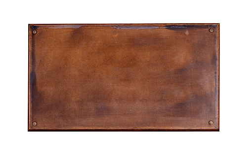 Placa de bronce de metal natural, tabla vintage de hierro aislada sobre blanco photo