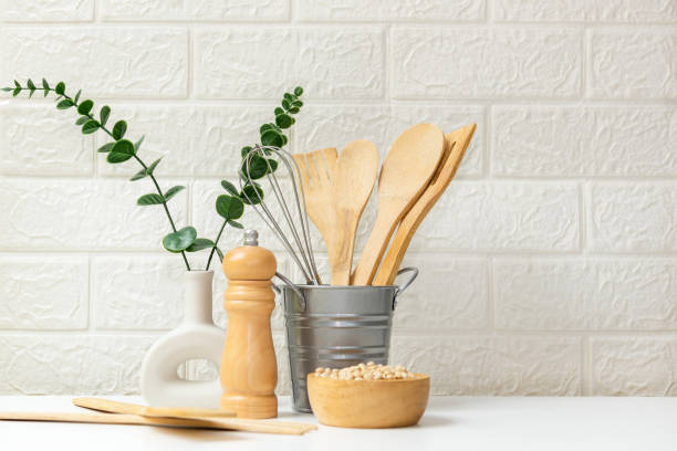 istock Kitchen tools and kitchenware utensil object on kitchen shelf wood white for healthy eat and health care life.  Wall white brick background, copy space for text 1402865813