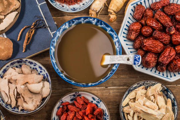 Various Chinese herbal medicines made into a bowl of Chinese medicine Various Chinese herbal medicines made into a bowl of Chinese medicine dieng plateau stock pictures, royalty-free photos & images