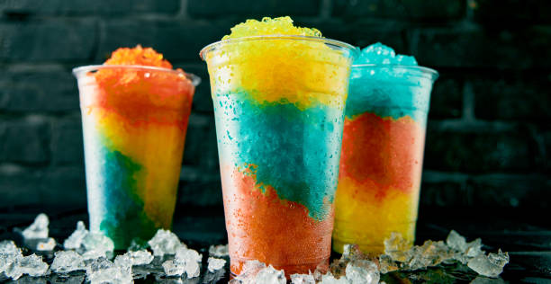 istock Amazing and funny drinks in a row on black background. 1402866903