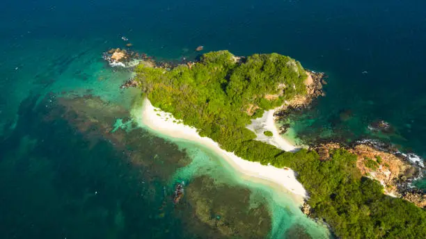 Photo of Aerial view of Seascape with a tropical Pigeon Island.