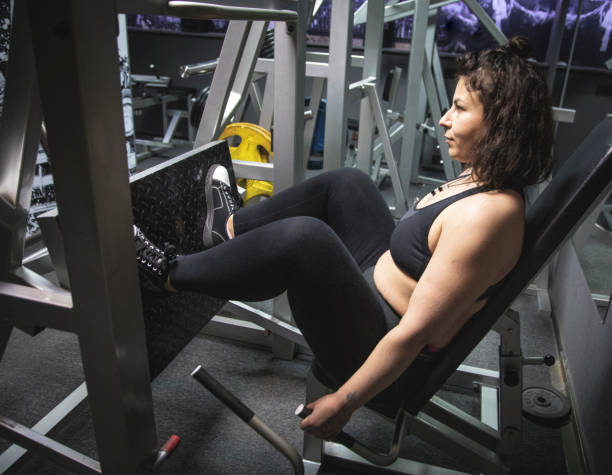 istock Indian woman Doing Leg Extensions 1402870761