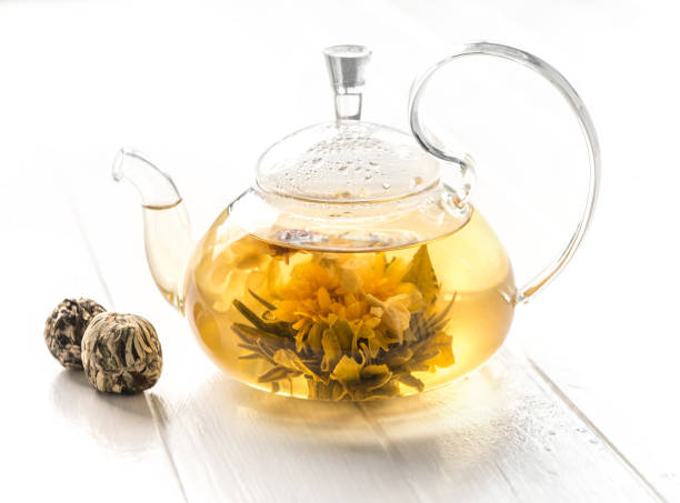 istock Fully brewed blossoming tea in a pot 1402871116