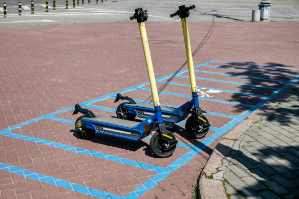 istock Parking E-scooters, Eco friendly mobility concept of sharing transportation with Electric Scooter 1402872388