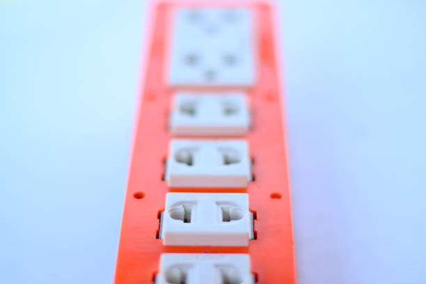 istock Outlet is an electrical device that acts as a connection point for electricity to flow through 1402872813