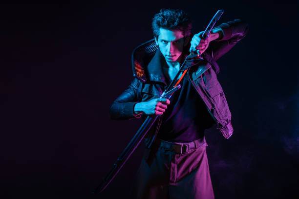 istock A guy in a cyberpunk image, holding a tuned sword in his hands. Cyborg samurai. 1402873982