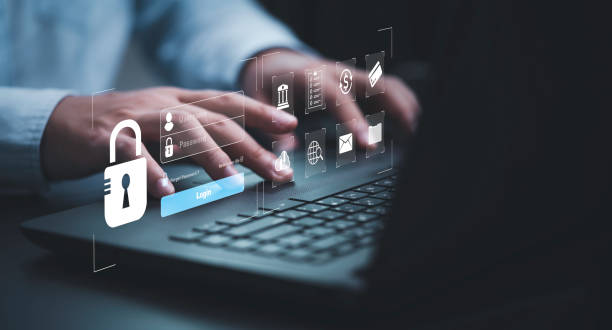 istock Businessman typing on keyboard laptop computer to input username and password for technology security system and prevent hacker concept. 1402874682