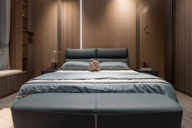 istock Warm light bedroom environment, light green bed and back cover 1402880349