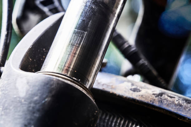 istock Macro shot of shock absorber on front fork of bicycle 1402880550