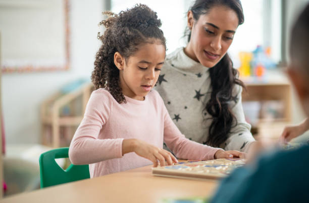 istock Daycare kids play collaboratively 1402880634