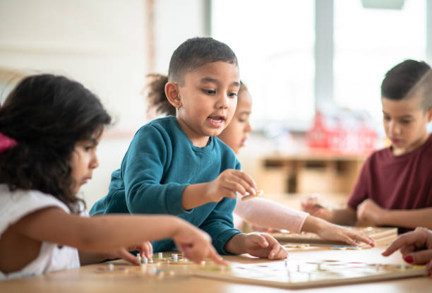 istock Daycare kids play collaboratively 1402880639