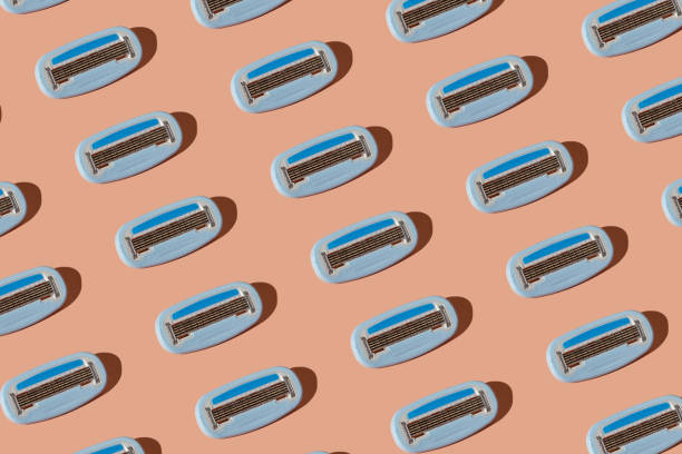 istock A pink women's shaving razor flat lay. 1402880788