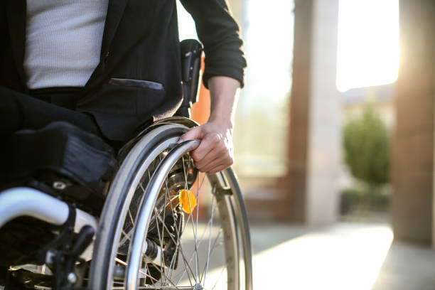 istock Disabled woman in a wheelchair 1402881055
