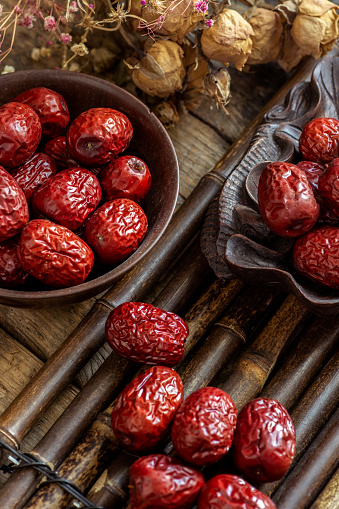 Dried red Jujube on the bamboo table