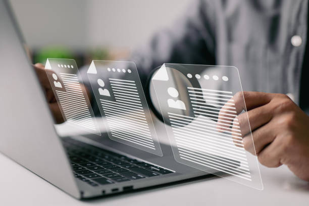 istock Agency interview pick a resume method for job hiring and internet recruitment. 1402883498