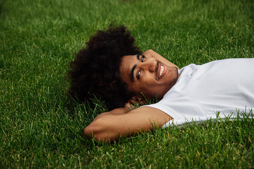 Portrait of a young handsome afro man