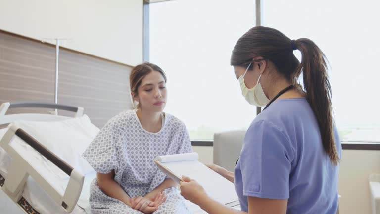 While in the hospital, patient talks with doctor