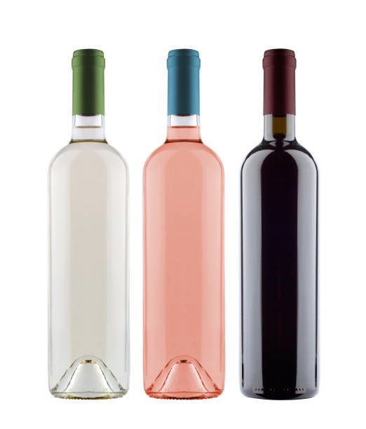 front view of rose white and red wine bottles isolated on background stock photo