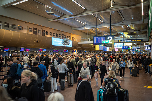 Stockholm, Sweden June 3, 2022 Passengers in the departure hall of Arlanda airport.