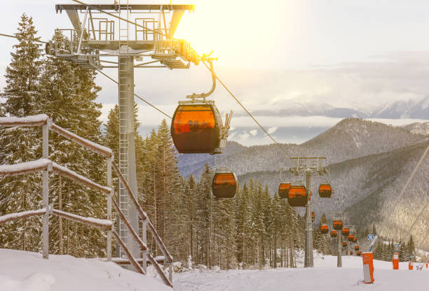 istock Winter mountain landscape, ski resort funicular view, cable car 1402893275