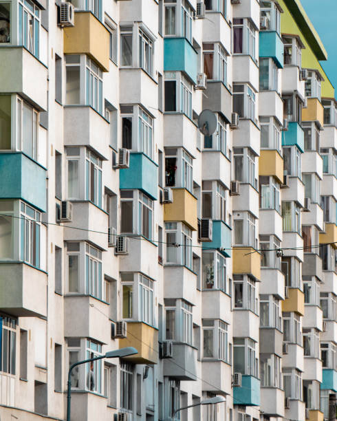 istock Pastel coloured apartment block 1402894831