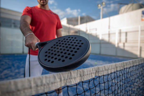 wide angle of paddle tennis player stock photo