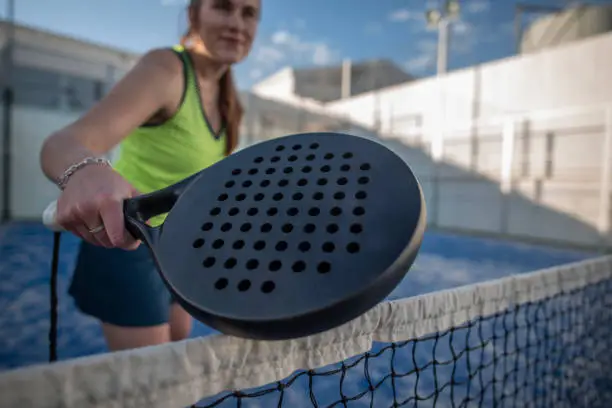 wide angle of paddle tennis player