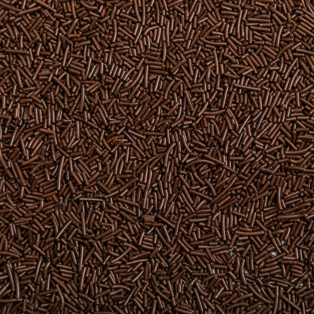 chocolate sprinkles Macro texture of chocolate sprinkles nonpareils stock pictures, royalty-free photos & images