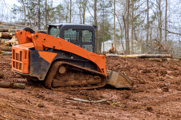 istock Tractor work with during landscaping works align the land for construction site 1402900771