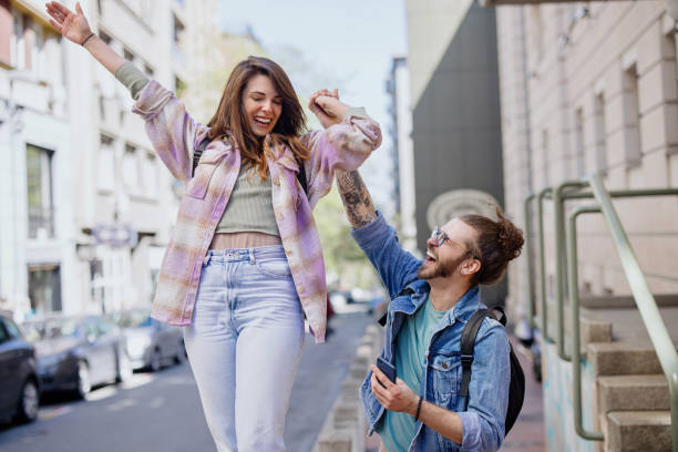 istock Young couple having fun in the city 1402901420