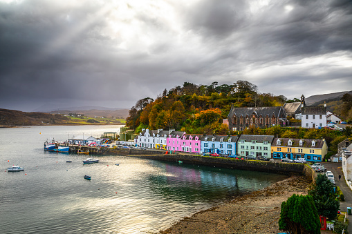 Portree harbour with its colourful houses in Scotland, UK.