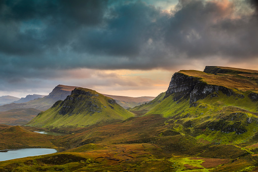 Moody sunset clouds over the Quiraing on the Isle of Skye in Scotland. The Quiraing is located on the north-east of the island.