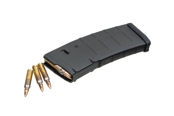 istock Cartridges and clips for a rifle or carbine. Ammunition for weapons. Isolate on a white background. 1402901726