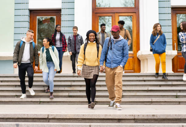 istock Students departing the university building 1402903584